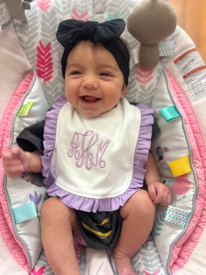 Ruffled baby bib