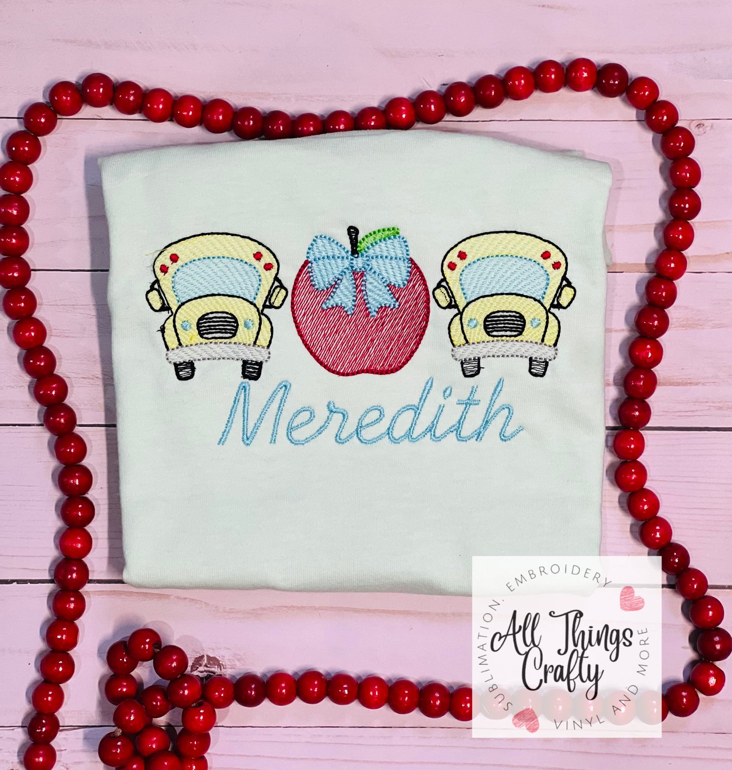 school bus apple embroidered tee