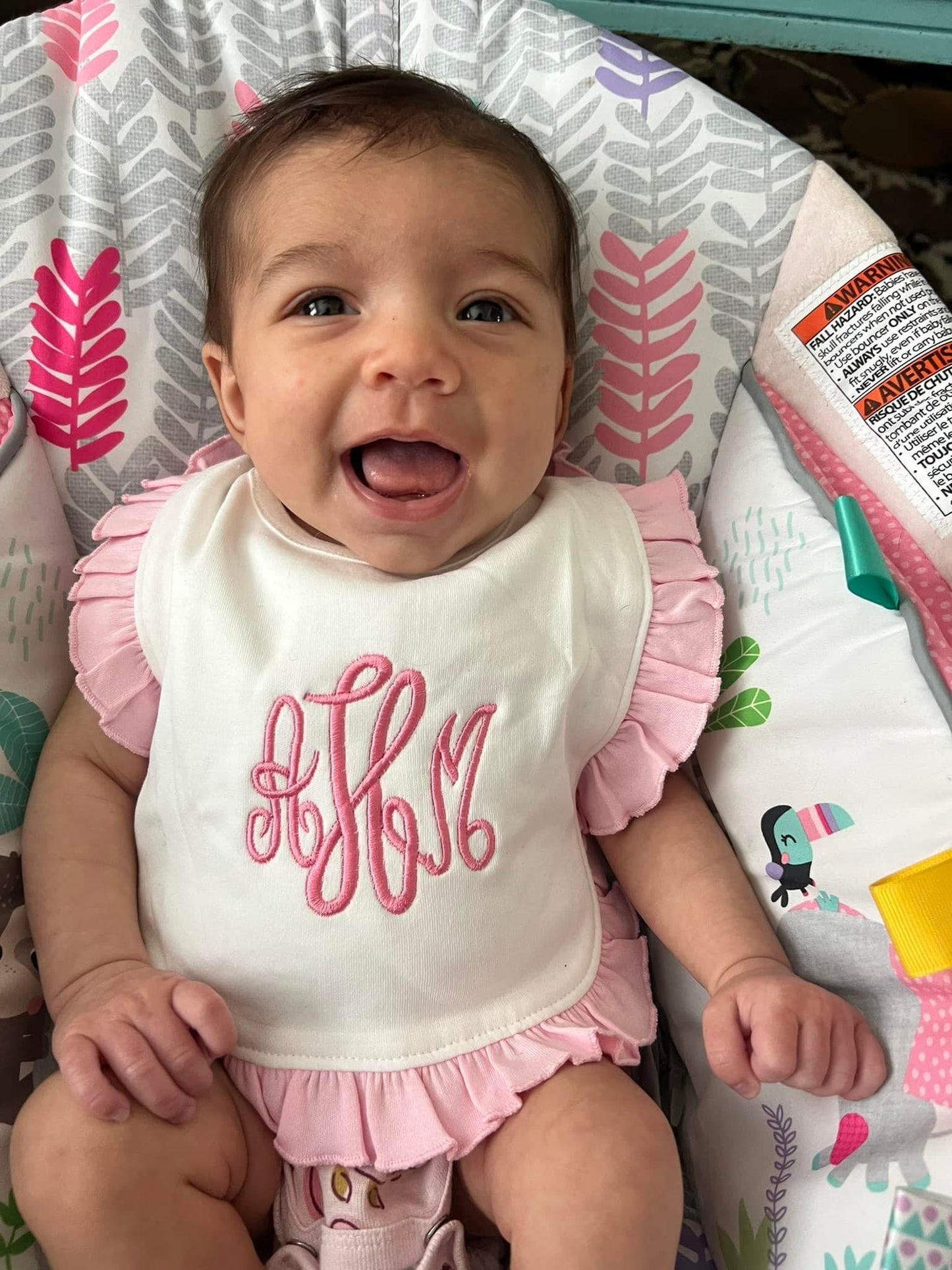 Ruffled baby bib