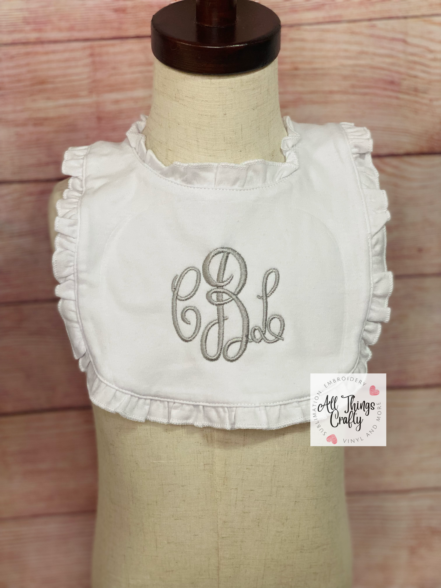 Ruffled baby bib